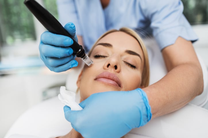 woman receiving cosmetic dermatology